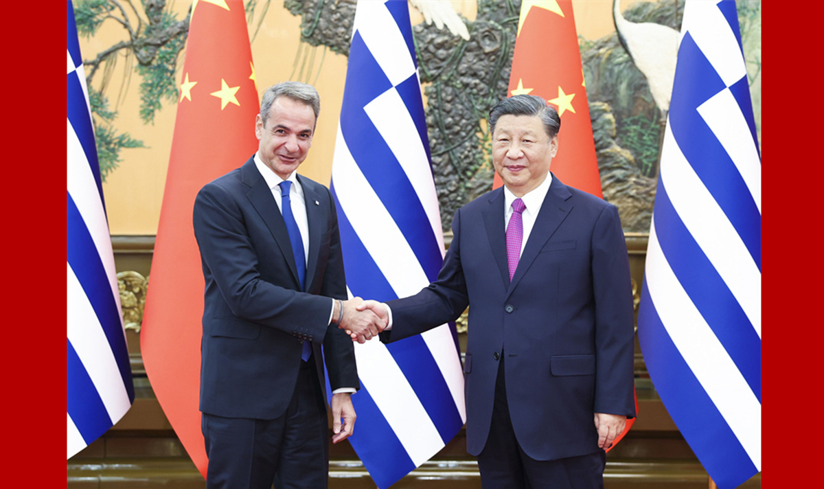 习近平会见希腊总理米佐塔基斯